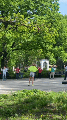 Outdoor dance class held in park on sunny morning