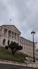 Afternoon documentation of Lisbon's Parliament district during cloudy weather