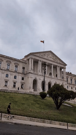 Afternoon documentation of Lisbon's Parliament district during cloudy weather