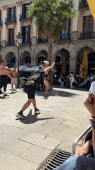 Acrobats perform human towers in Barcelona public square