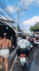 Songkran water festival celebrations enliven Thai street