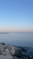 Serene seascape with pink horizon captured in Varna, Bulgaria