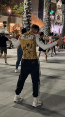 Late-night outdoor dance fitness session under a full moon, Pattaya