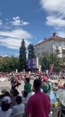 Street parade features costumes, performances, draws large crowds