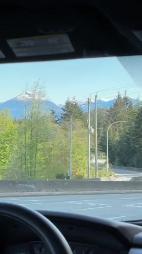 Motorist captures mountain view from vehicle in West Vancouver