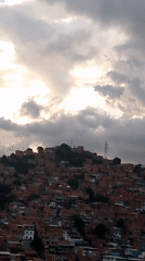 Caracas hillsides and skyline at golden hour