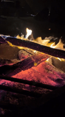 Campfire burns at night in Arad, Israel