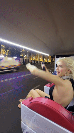Open-top ride through Tbilisi in coordinated black dresses