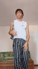 Young man documents outfit changes in Porlamar home