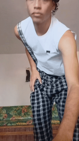 Young man documents outfit changes in Porlamar home