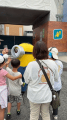 Early morning visitors enjoy Universal Studios Japan attractions and characters