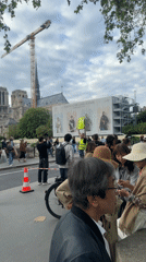 Crowd gathers at Notre Dame reconstruction site in Paris