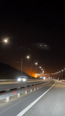 Nighttime highway traffic captured on video in Russia