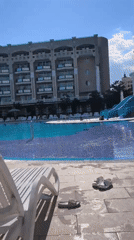 Resort pool scene at a Pomorie hotel on a sunny afternoon