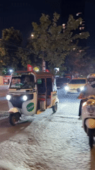 Phnom Penh nighttime traffic across two central districts