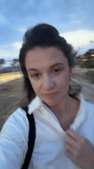 Woman photographed outdoors in Glifada, Greece evening scene