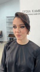 Woman gets hair styled at salon in Chaikovsky, Russia