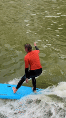 Surfers ride waves on Rotterdam waterway during afternoon session