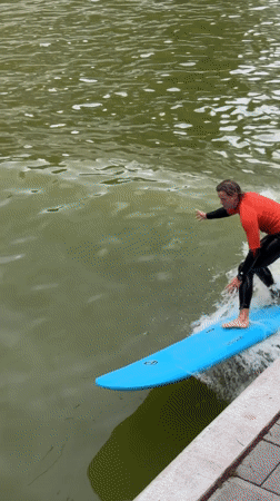 Surfers ride waves on Rotterdam waterway during afternoon session