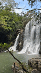 Morning waterfall documentation in Poththatawela, Sri Lanka shows rainbow mist