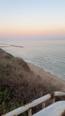 Dawn beach scenes captured along Netanya coastline with recreational activities