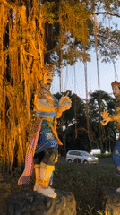 Illuminated Balinese cultural displays documented at Kuta Selatan park