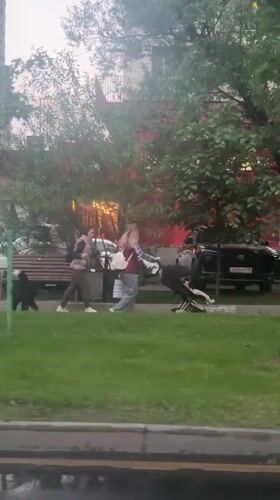 Woman walking in residential area of Odintsovo, Russia