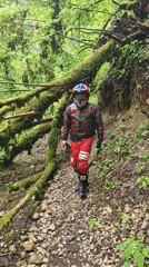 Motorcyclists document forest waterfall excursion near Lesnoe, Russia