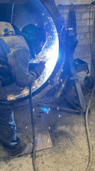 Welder works on metal object in Montenegro workshop