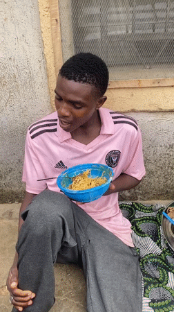Street food, motorcycles, and a local event in Jos, Nigeria