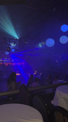 Laser lights and disco balls inside a Cuernavaca nightclub