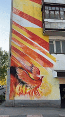 Spring scenes documented in Ufa: building mural, budding spruce trees