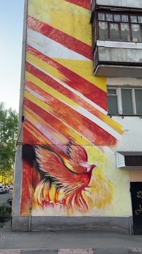 Spring scenes documented in Ufa: building mural, budding spruce trees
