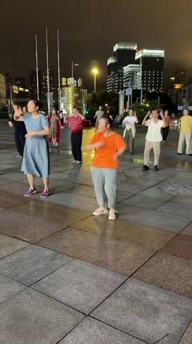 Evening plaza dancing and exercise in Liangjiang, Chongqing