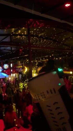 Indoor party documented with lighting effects in Thailand