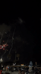 Fourth of July fireworks over a decorated Surfside Beach house