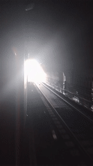 Tunnel passage toward bright exit captured in Thane