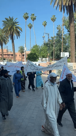 Workers in green uniforms stage May Day protest in Marrakesh