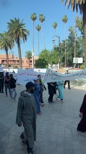 Workers in green uniforms stage May Day protest in Marrakesh