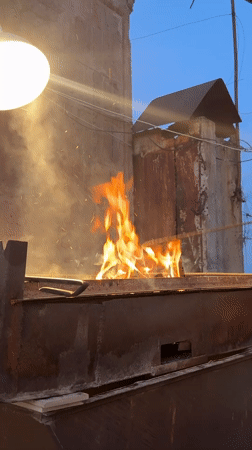 Sunset gathering with outdoor fires captured across Yerevan, Armenia