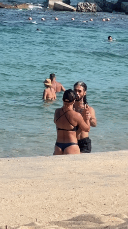 Tourists enjoy beach morning at Nha Trang, Vietnam