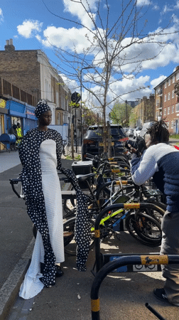 Women gather for fashion activity in London industrial space