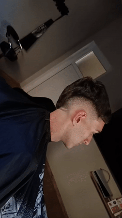Young man gets bowl cut haircut in Septemvri, Bulgaria