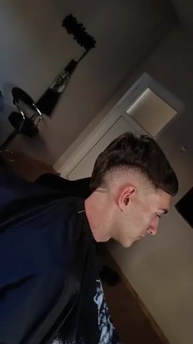 Young man gets bowl cut haircut in Septemvri, Bulgaria