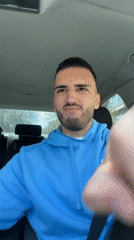 Driver gestures at camera while driving in Plovdiv