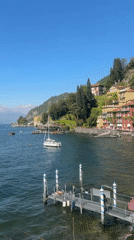 Tourists enjoy sunny afternoon at Lake Como's Varenna