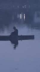 Evening fisher spotted in misty waters near Lhokseumawe