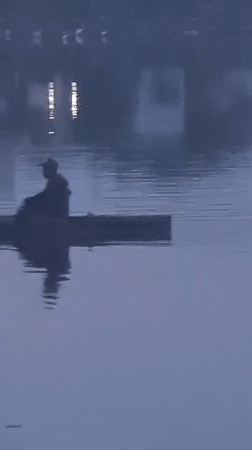 Evening fisher spotted in misty waters near Lhokseumawe