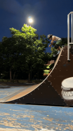 Night session at Blagoevgrad skatepark — scooters and bikes on ramps
