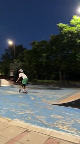 Night session at Blagoevgrad skatepark — scooters and bikes on ramps
